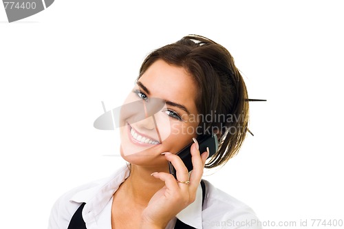 Image of Smiling woman speak on cell phone