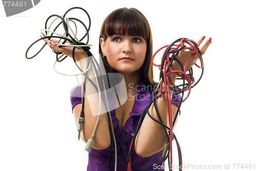 Image of Young woman hold wires and have problem