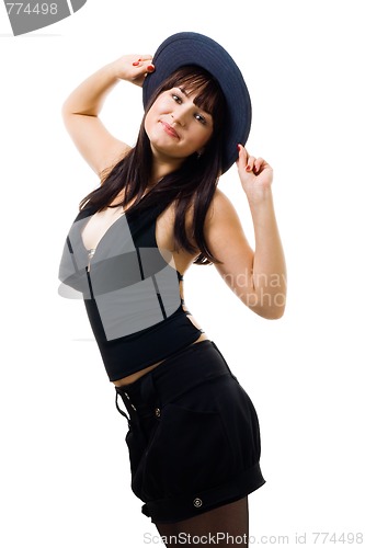 Image of Young happy woman hold hat and look at camera