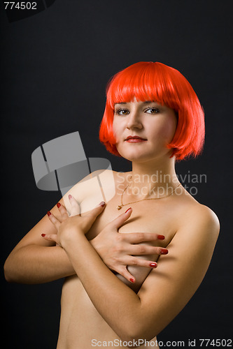 Image of Young naked woman with color hair