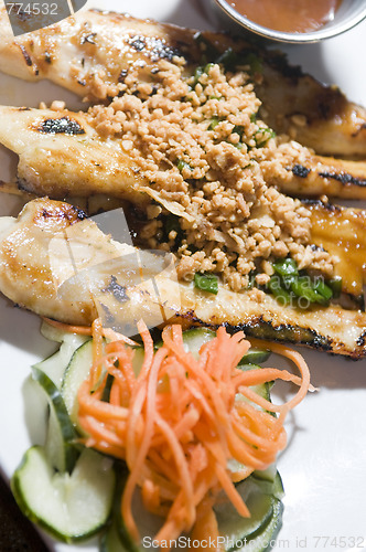 Image of vietnamese food appetizer ga nuong sate grilled chicken