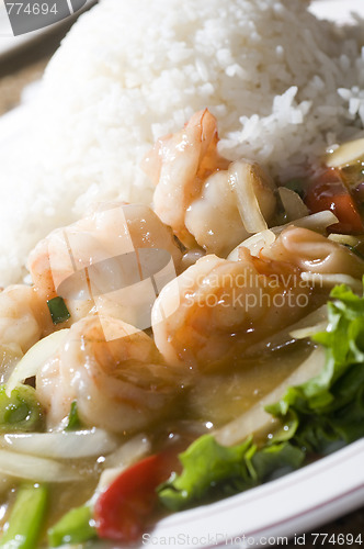 Image of vietnamese food prawn sauteed in ginger honey sauce tom xao gung