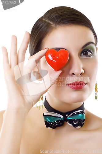 Image of  woman holding a red heart