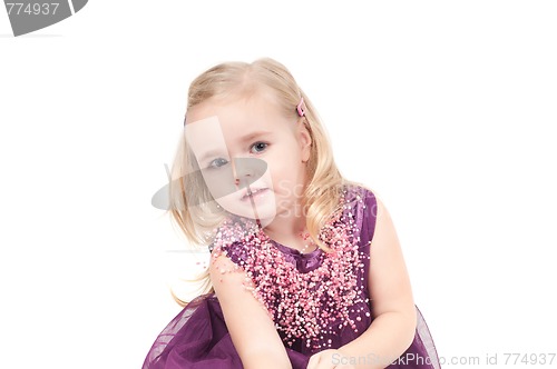 Image of Studio shot of baby girl in gala dress