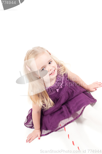 Image of Studio shot of baby girl in gala dress