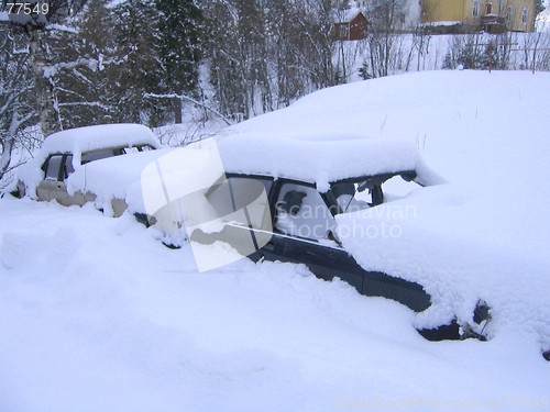 Image of Car wrecks under snow