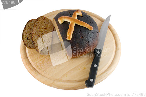 Image of Bread sliced on board