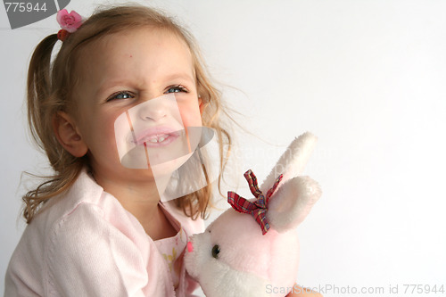 Image of Baby girl and pink bunny