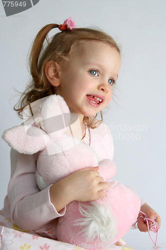 Image of Baby girl and pink bunny