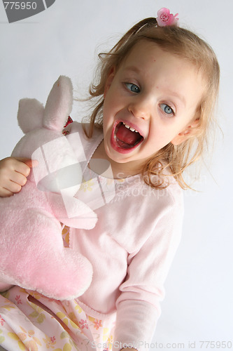 Image of Baby girl and pink bunny