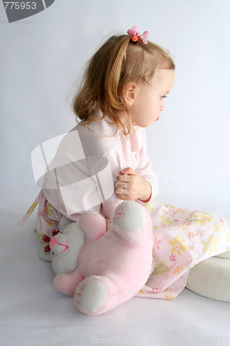 Image of Baby girl and pink bunny