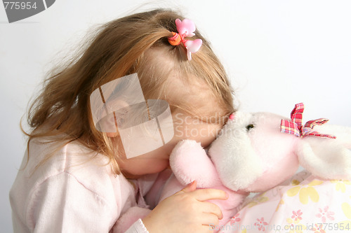 Image of Baby girl and pink bunny