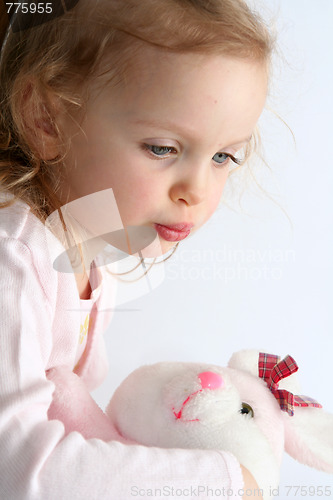 Image of Baby girl and pink bunny