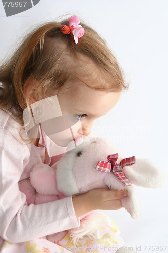 Image of Baby girl and pink bunny