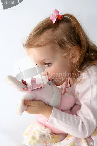 Image of Baby girl and pink bunny