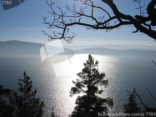 Image of Fjord view with sun reflection