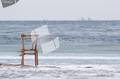 Image of Chair washed ashore and BarsebÃ¤ck in the background
