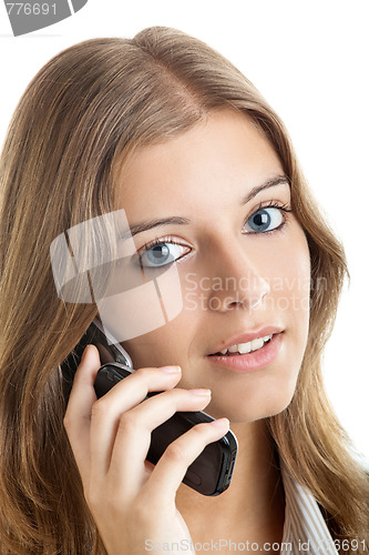 Image of Business woman using a cell phone