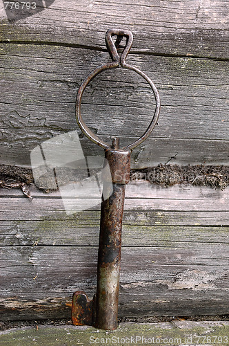 Image of Forged Vintage Key On The Wall