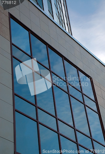Image of Sky Reflection In The Windows Of The Office Building