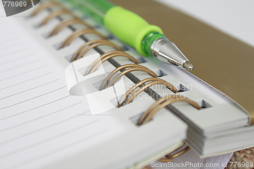 Image of A pen and a notebook
