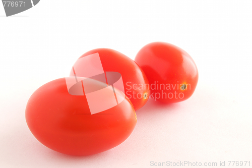 Image of Three baby tomatoes