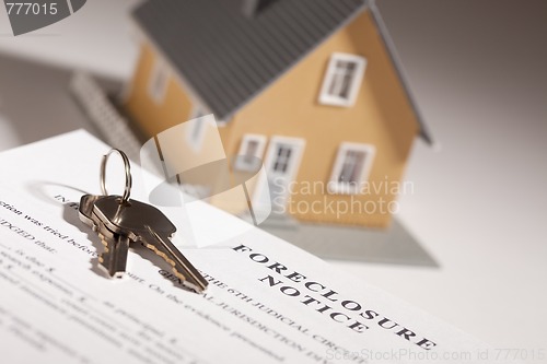 Image of Foreclosure Notice, House Keys and Model Home on Gradated Backgr