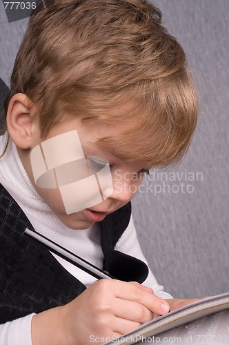 Image of Boy writing