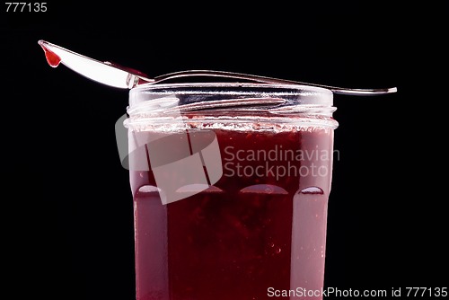 Image of jam and tea spoon