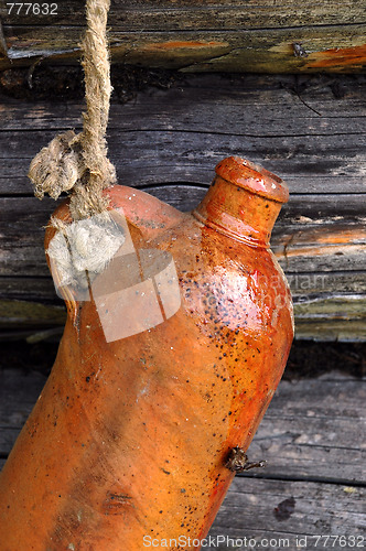 Image of Ceramic Bottle On The Rope