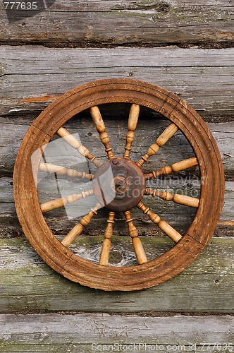 Image of Spinning Wheel On The Blockhouse Wall