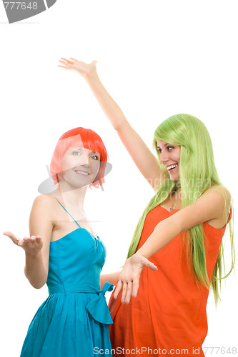 Image of Two surprised young women with color hair 