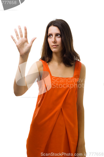 Image of serious woman pushing abstract interface in air