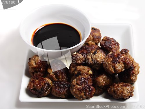 Image of Meatballs and brown sauce dip