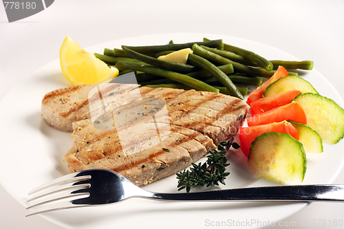 Image of Grilled tuna meal with fork