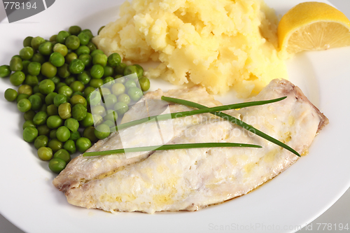 Image of Baked fish, lemon and vegetables