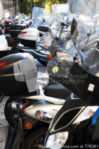Image of  motorcycles parked on the street