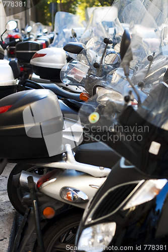 Image of  motorcycles parked on the street