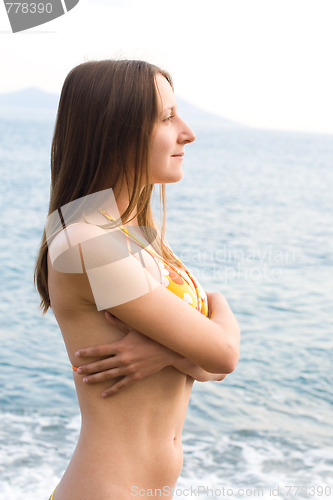 Image of Young woman in bikini 