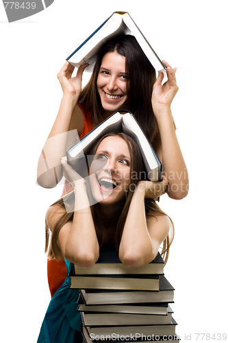 Image of Two happy women with books together