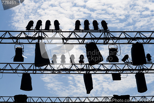 Image of Stage lights silhouette and sky