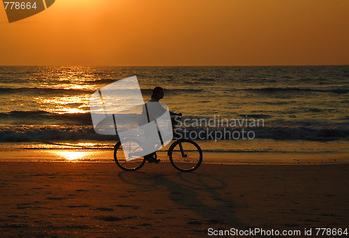 Image of Cyclist At Sunset