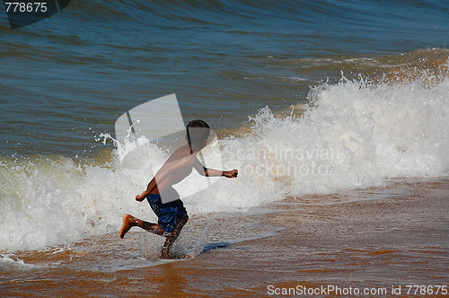 Image of Running Away from the Wave