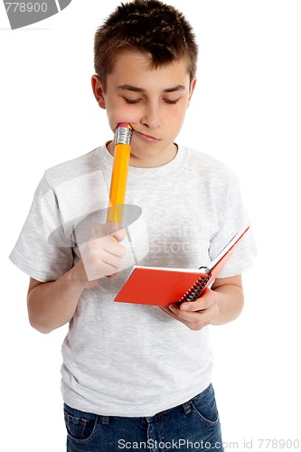 Image of Child with notebook and pencil