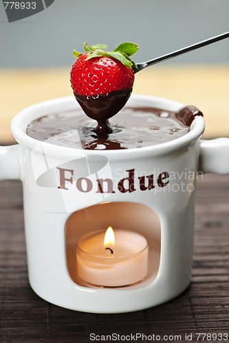 Image of Strawberry dipped in chocolate fondue