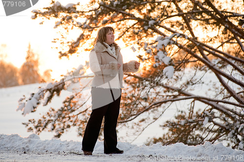 Image of Women on winters sunset