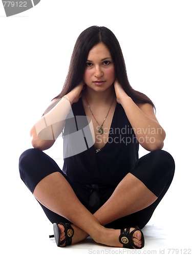 Image of Young brunette sitting