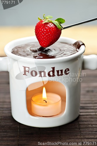 Image of Strawberry dipped in chocolate fondue