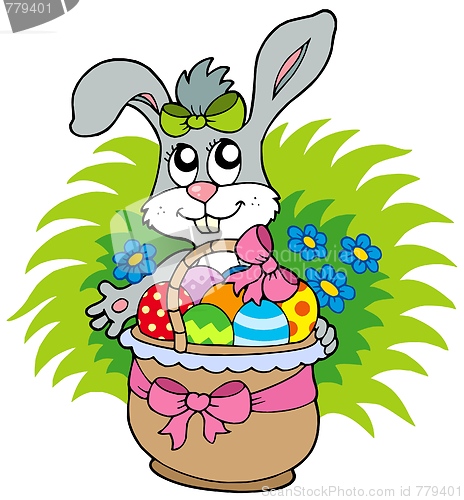 Image of Easter bunny with eggs in basket