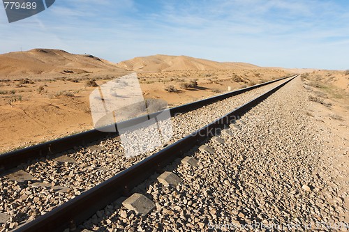 Image of Straight railway in the desert to the horizon